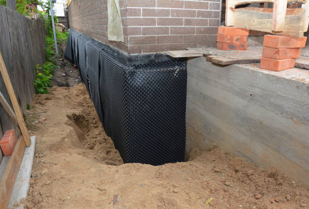 Happy homeowners after waterproofing job in Essington